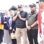 Plt. Sekcam Loa Kulu Hadiri Pawai dan Beseprah dalam Rangka HUT ke-43 Desa Margahayu