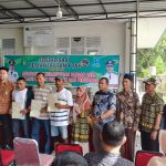 Kasi Pemerintahan Kecamatan Loa Kulu Hadiri Penyerahan Sertifikat PTSL dan Sosialisasi Pajak di Desa Ponoragan